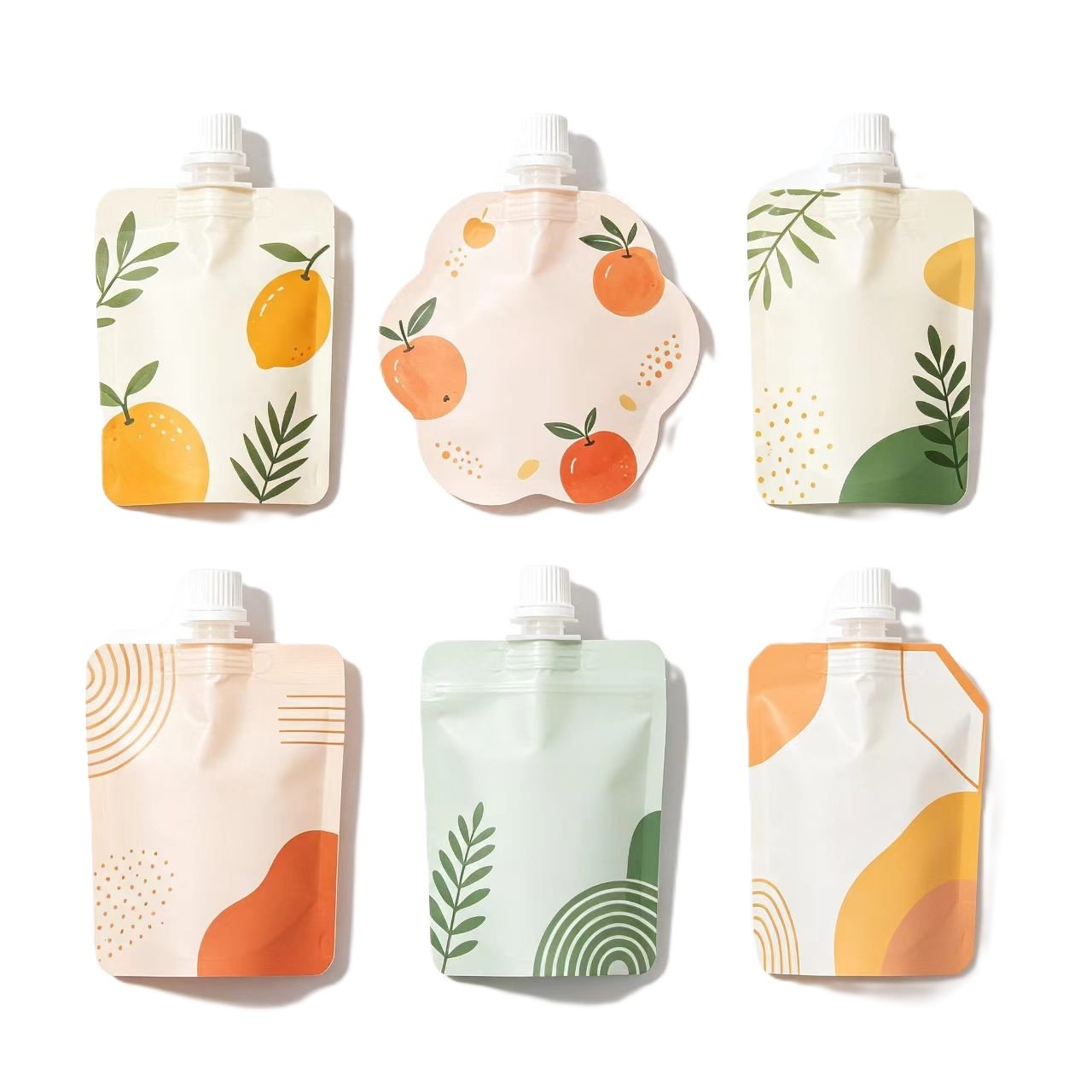 A collection of various custom shaped spouted pouches in unique die-cut designs and colorful prints for baby food and juice.
